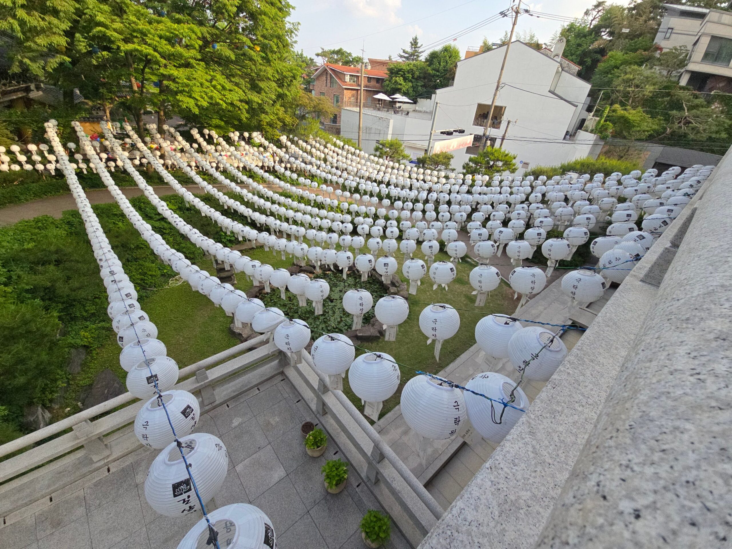 Rows of white paper lanterns filling the courtyard at Gilsangsa temple, Seongbuk-dong